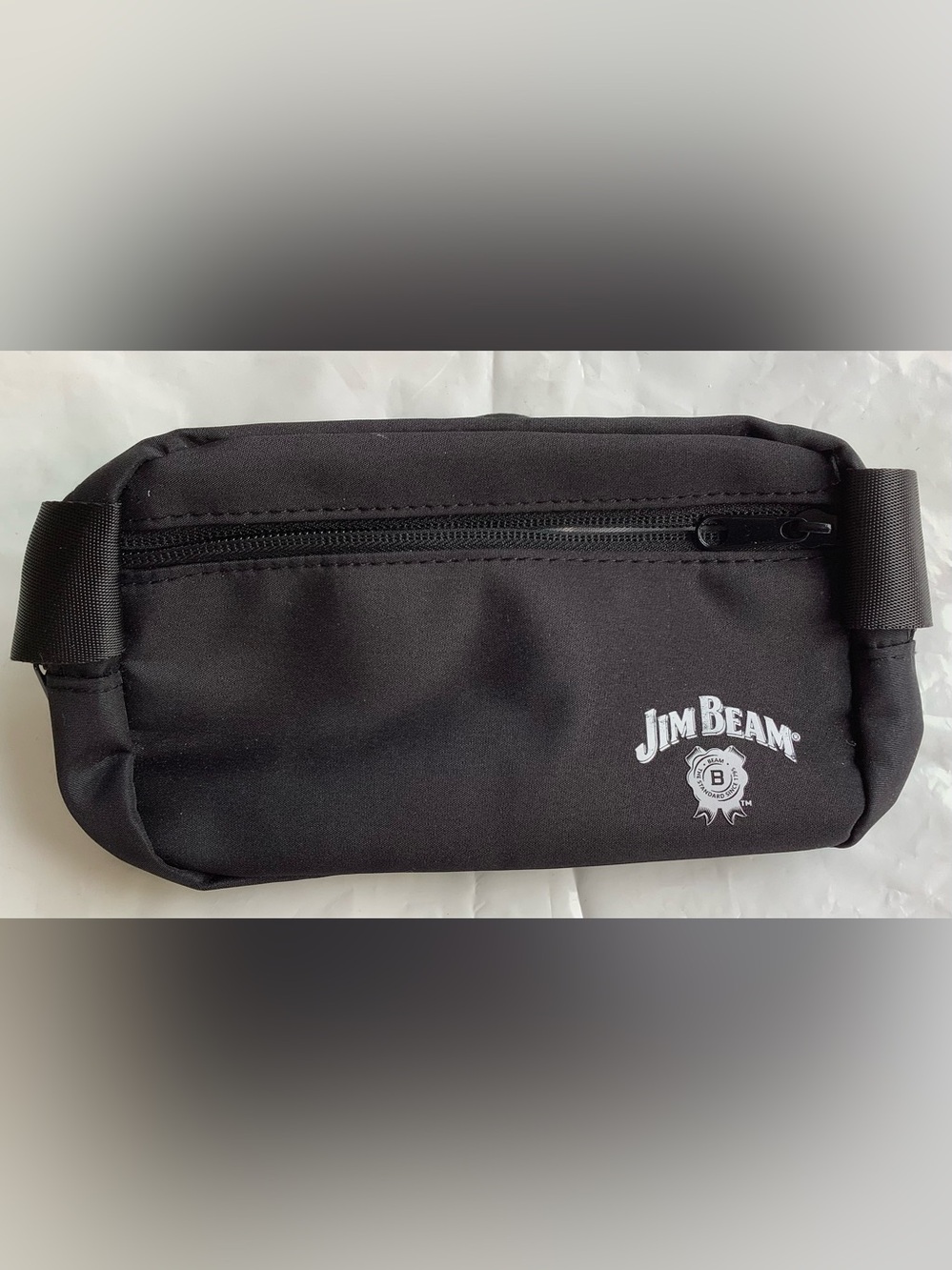 Jim Beam belt bag features a black bag with the iconic logo on the front.